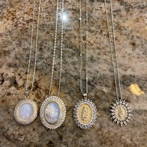 Small gold necklace on the right